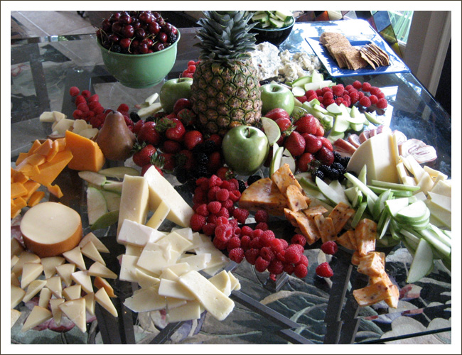fruit and cheese on table